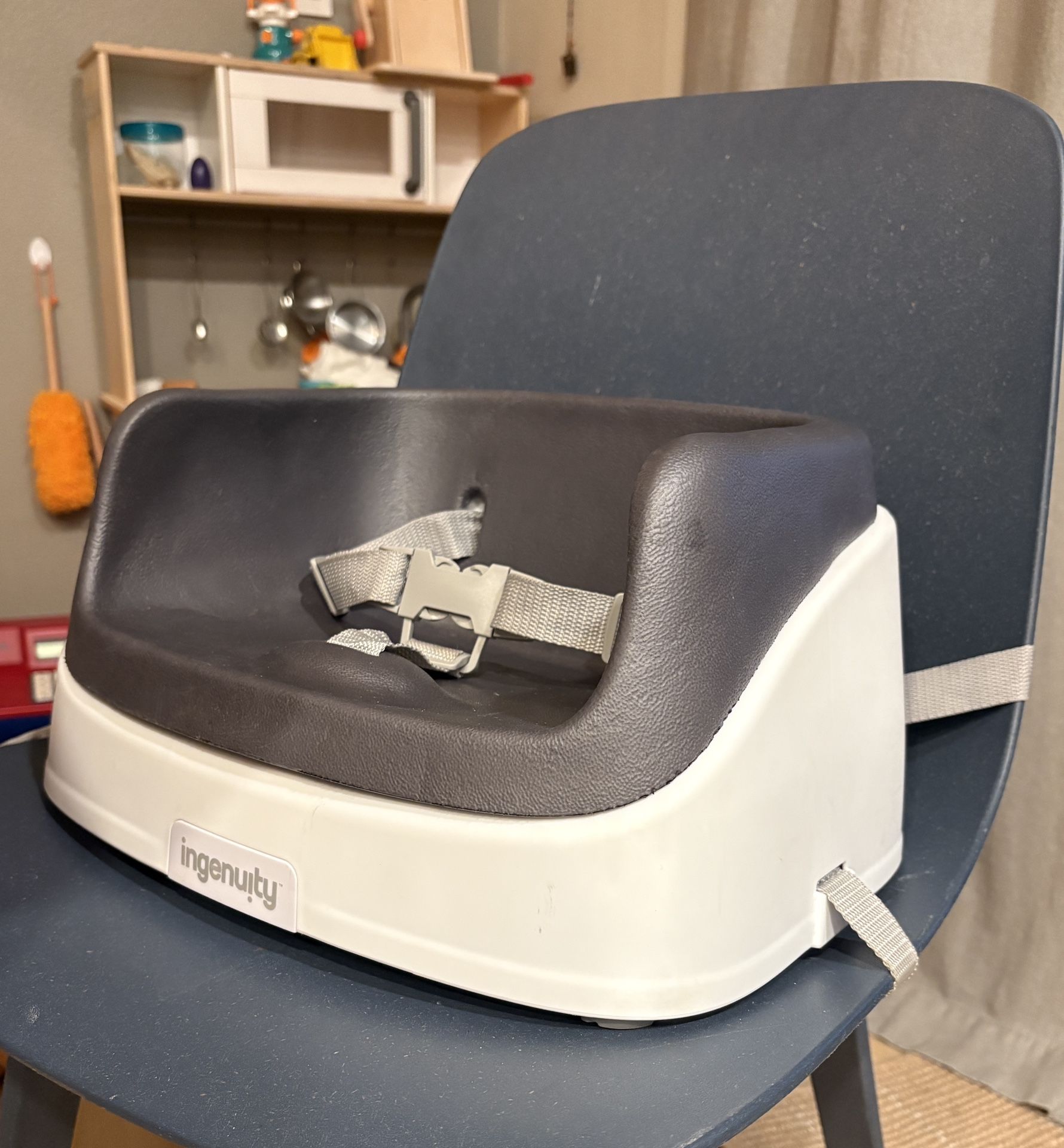 Secure toddler booster seat for on a stable adult chair