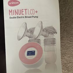 Uni Mom Breast pump NEVER USED