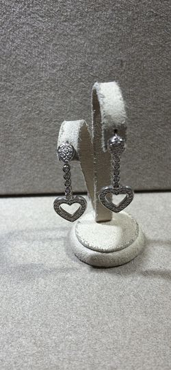 Gold diamond dangling earrings