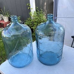 Two 5 Gallon Glass Water Jugs