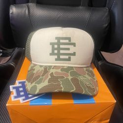 ERIC EMANUEL EE TRUCKER CAMO GREEN HAT