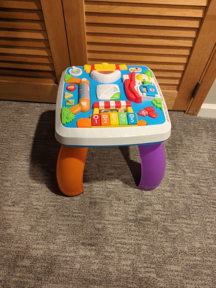 Fisher-Price Laugh & Learn Baby to Toddler Toy, Around the Town Learning Table with Music Lights