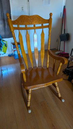 Wooden Rocking Chair with Carved Back