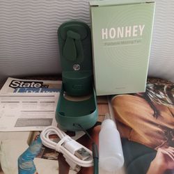Hand Held mini fan and humidifier