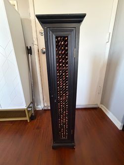 Tall Black Wood Cabinet with Lattice Door [OBO]