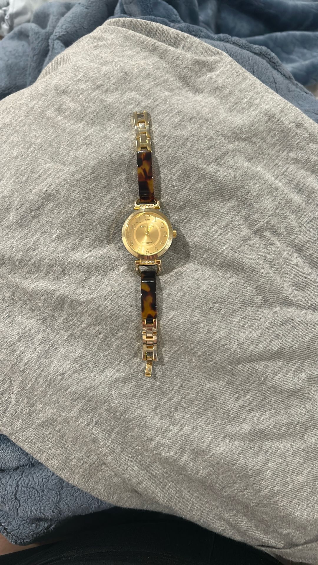The watch movement is made in Japan, as indicated by "Japan MOVT" on the dial.