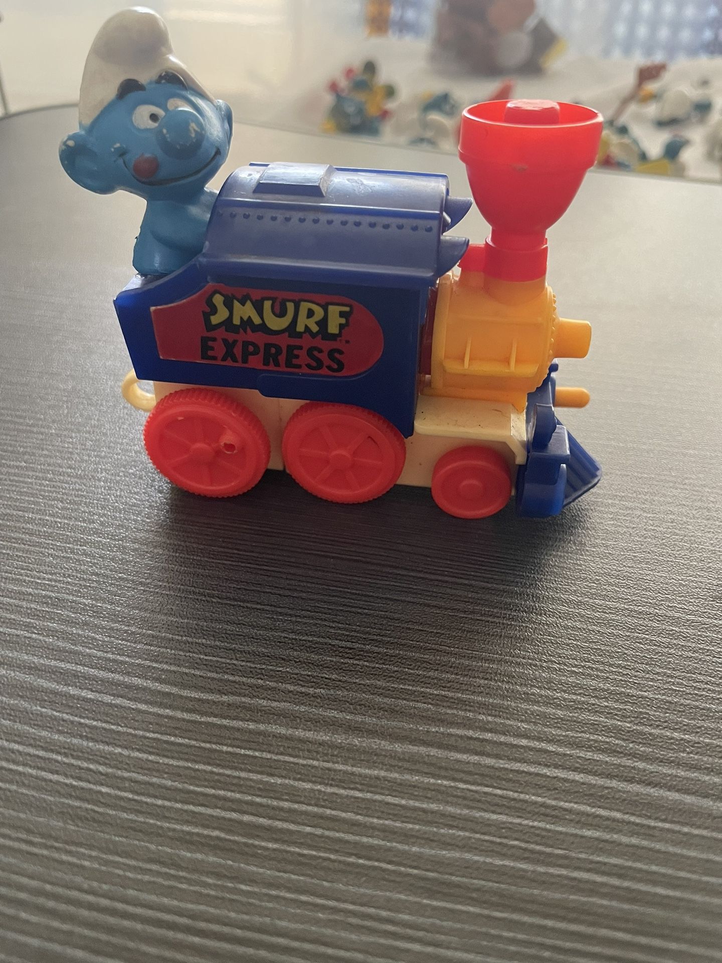 Smurfs Train vintage smurfs- 1982 - wind up Smurf express train for Sale in Delray ...
