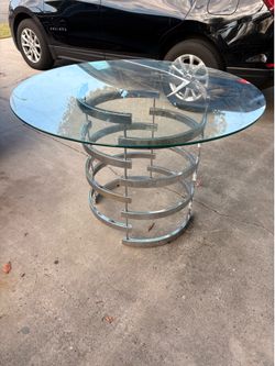 Glass round dinner table