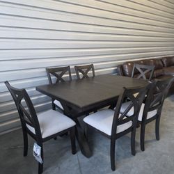 New Costco Westen Dining Table and 6 Chairs

Constructed of Rubberwood and Poplar Solids with Oak Veneers
Self-Storing 18” Leaf
Light Gray Fabric Upho