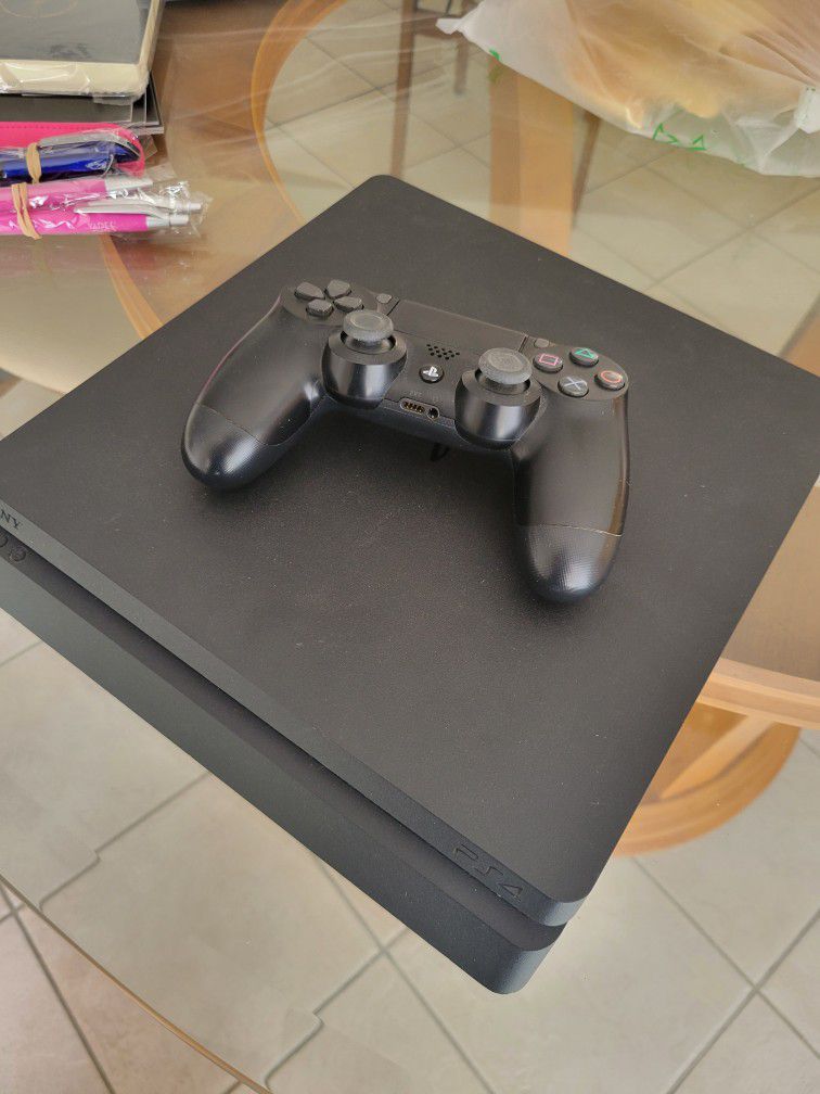 PS4 with controller 