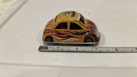 Vintage Tin Toy Car with Tiger Graphics