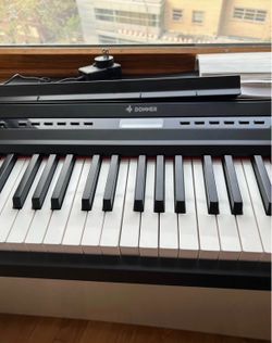 Donner DEP-20 88-Key Digital Piano in excellent working condition.
