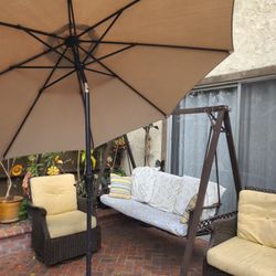2 patio chairs and swing