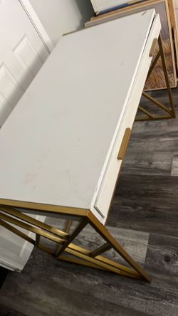 White desk with gold trimming
