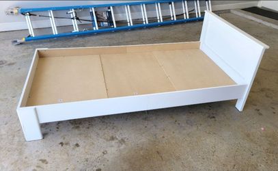 2 TWIN BED FRAMES AND SMALL TABLE