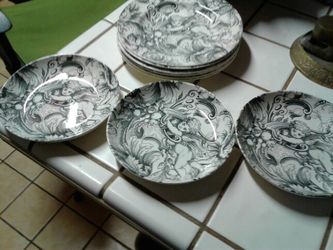 Plates and bowls .This particular style has been discontinued.Very nice.