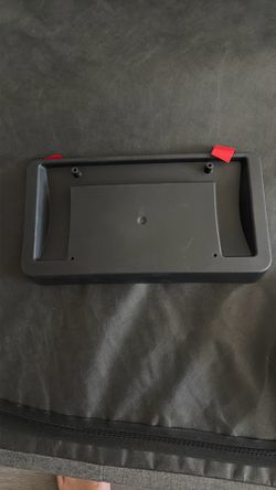 Tesla front plate holder