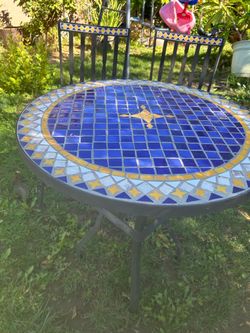 Patio con 2 Sillas $60