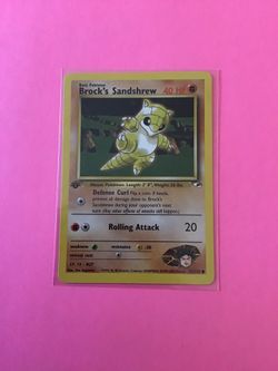 1st Edition Brock’s Sandshrew 71/132 Pokemon Card from Gym Heroes 