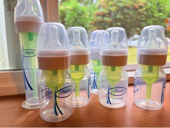 6*Dr brown 60 ml bottle with P nipple + 5 pacifier (FREE)