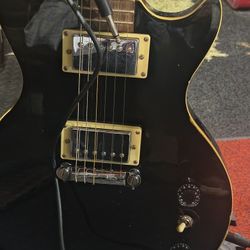 2 Electric Guitars,1 Acoustic,And One Amp With Cords And Mics