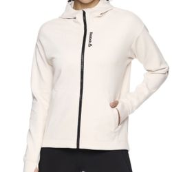 Reebok beige Women's Spirit Zip Up Jacket with Pockets size Medium.   (AN)