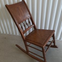 Kids wooden rocking chair 
