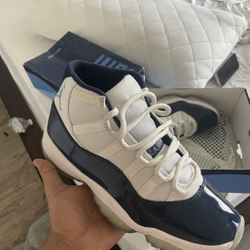 University Blue Jordan 11s