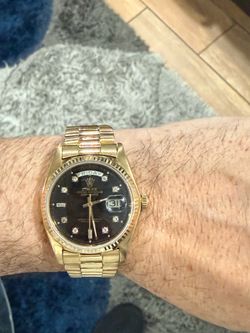 Rolex day date 36 gold watch