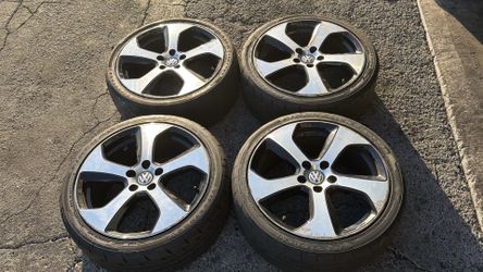 Volkswagen Golf GTI 18 Inch factory aluminum wheels with old tires 5x112mm