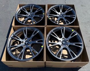 “19 Tesla model y Dark Gemini rims/wheels (exchange available)
