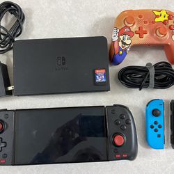 OLED Nintendo Switch with Extras