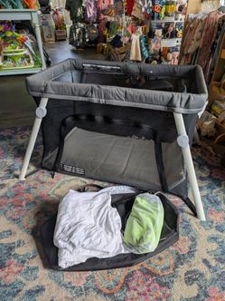 Guava Lotus pack n play portable travel crib compact plus accessories sun shade mattress pad sheets