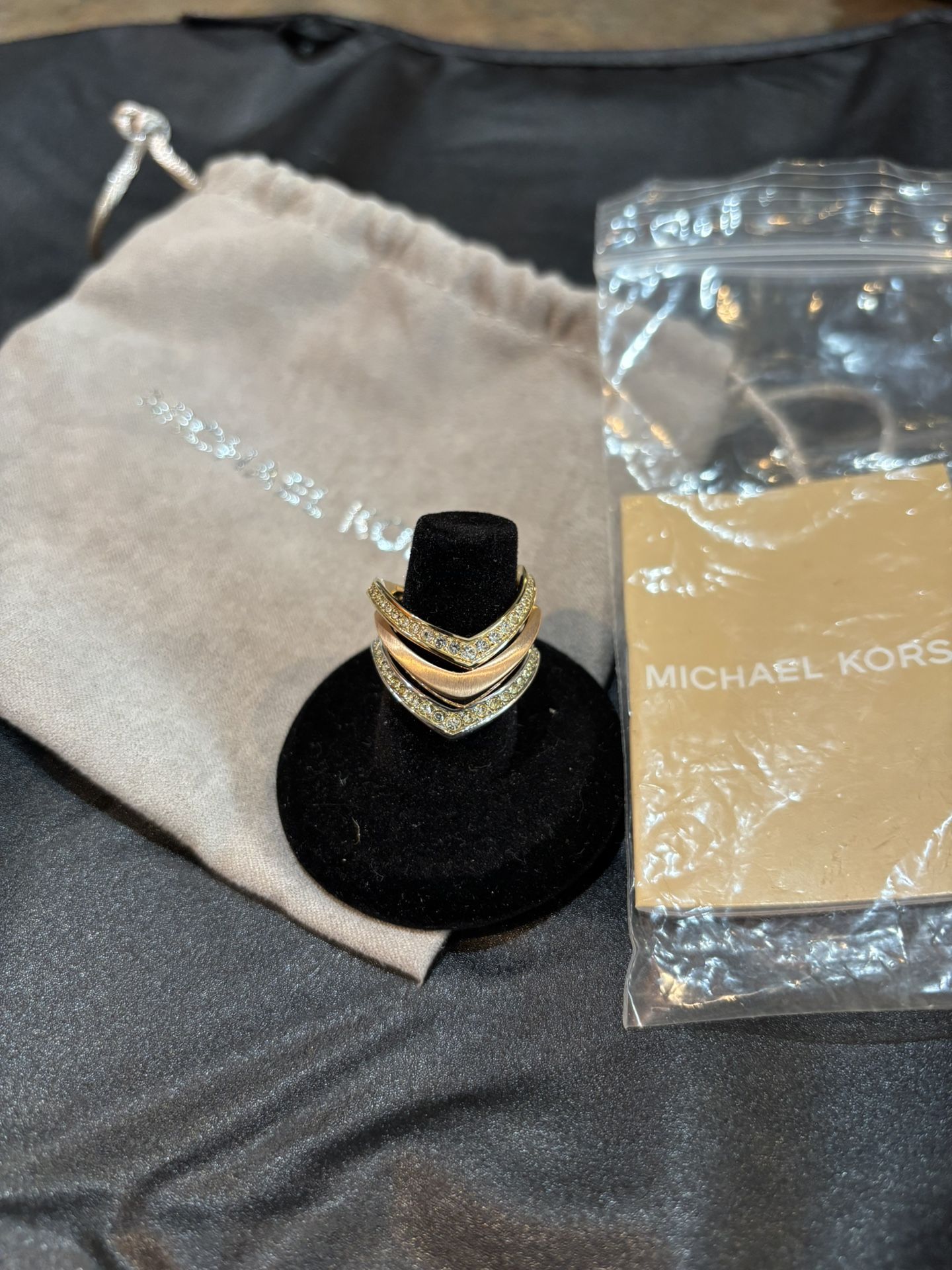 Michael Kors womens set of 3 rings. Goldstone and silver tone with crystals size 8. Great Gift