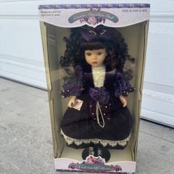 Victorian Collection Genuine Porcelain Doll by Melissa Jane, likely from the late 1990s