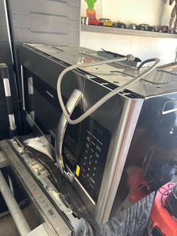 Frigidaire Over-the-Range Microwave Stainless Steel - Nuevo
