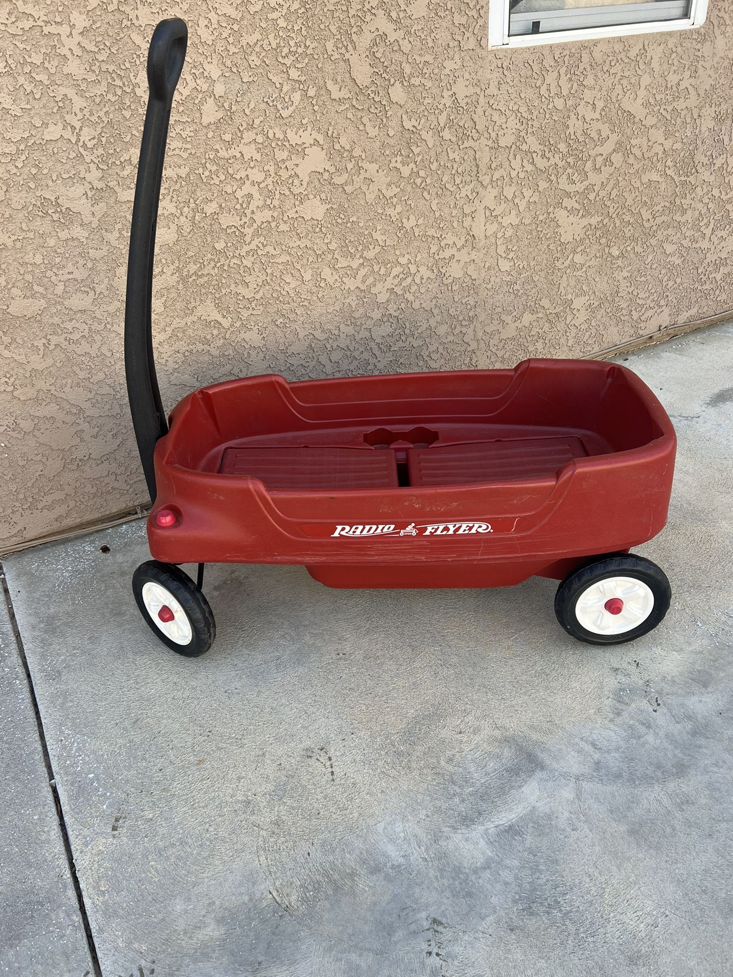 Red Plastic Radio Flyer Wagon