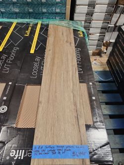 A&A Surfaces
Forrest Brown 20 MIL x 9 in. W x 48 in. L Waterproof Loose Lay Luxury Vinyl Plank Flooring (23.95 sq. ft./Case)