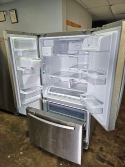 samsung three doors stainless steel refrigerator.