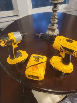 2 Dewalt Drills, 2 Charging Batteries & Charging Station