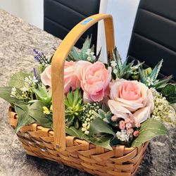 A basket of artificial flowers arrangement