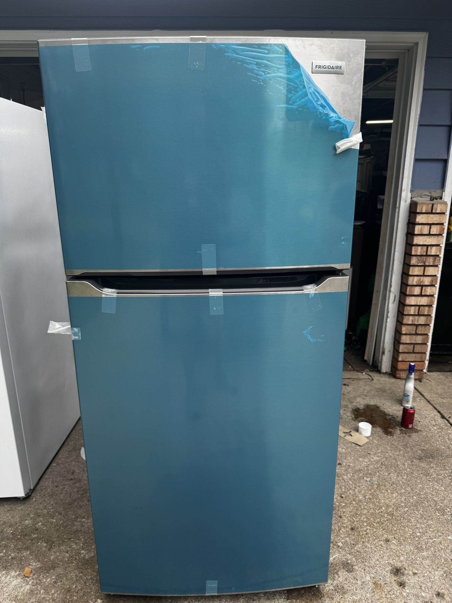 Black, White And Stainless Frigidaire Refrigerators