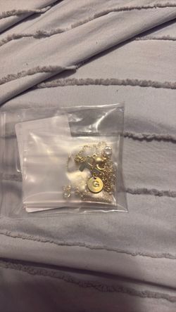 G cross gold necklace