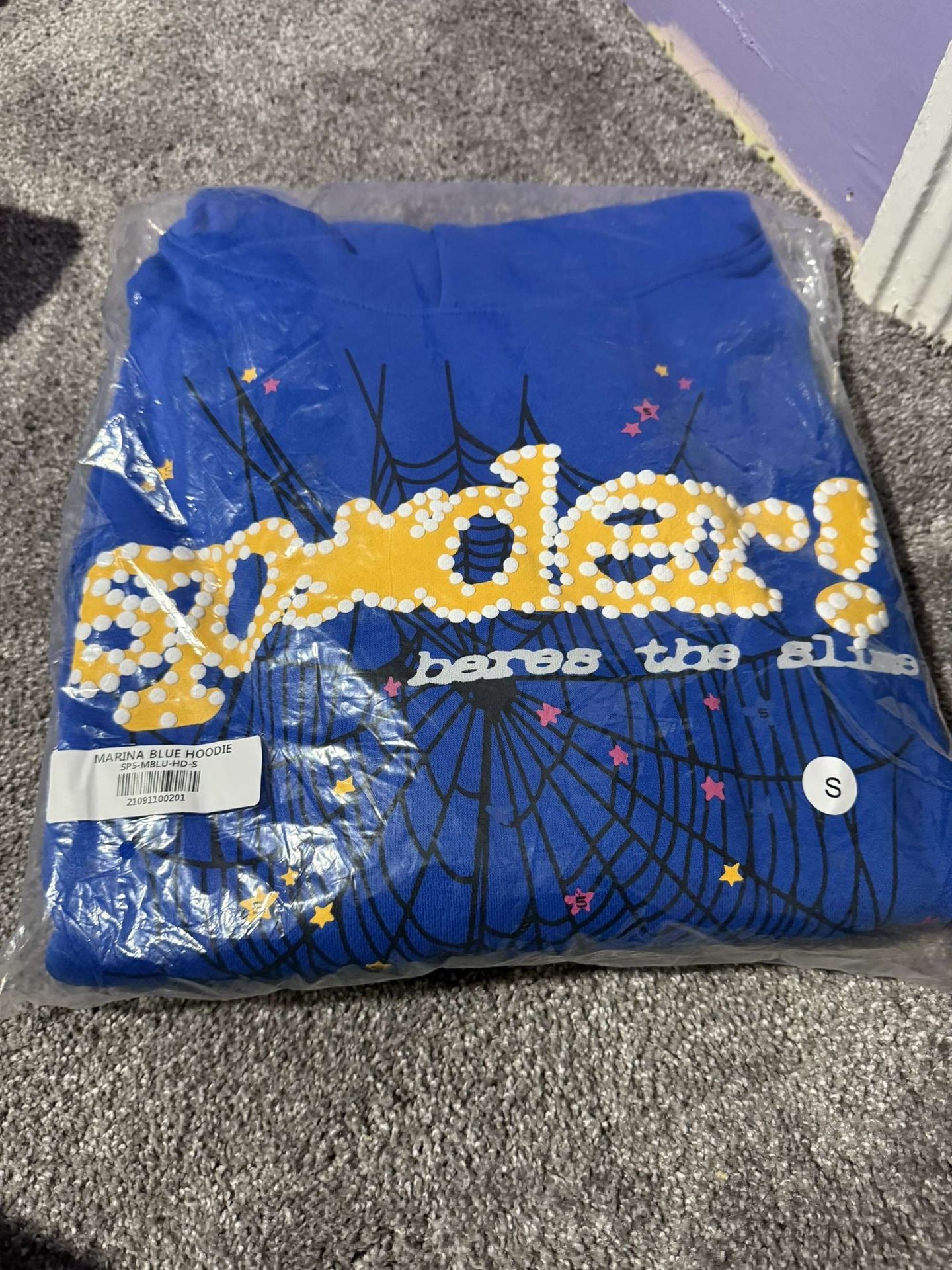 Blue and yellow Sp5der hoodie