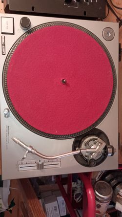 2 Technics 1200MK2 turntables and mixer.