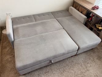 Cordell reversible sleeper sectional with ottoman deals