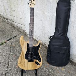 Electric Guitar With Bag And Accessories. A3