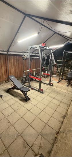 Smith machine weights benches and squat rack