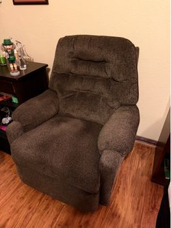 Brown small recliner chair