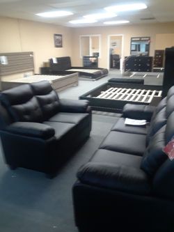Sofa and loveseat black leatherette